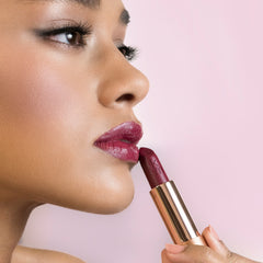Model applying 11 Scarlet Blaze - Natural Lipstick 